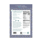 Back of LillyBean Chocolate Cake & Cupcake Mix pouch showing ingredients, allergen statement and cupcake and cake directions